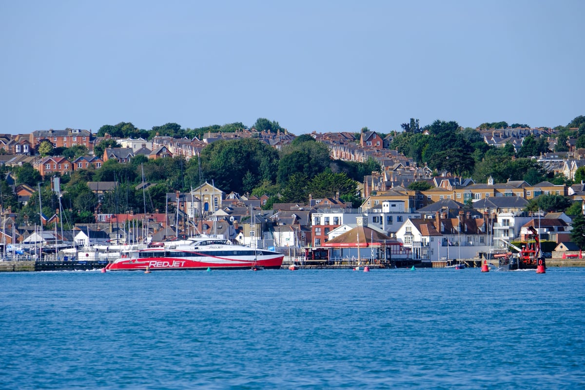 Cowes on the Isle of Wight, the centre of British sailing, viewed from the water from a sailing yacht