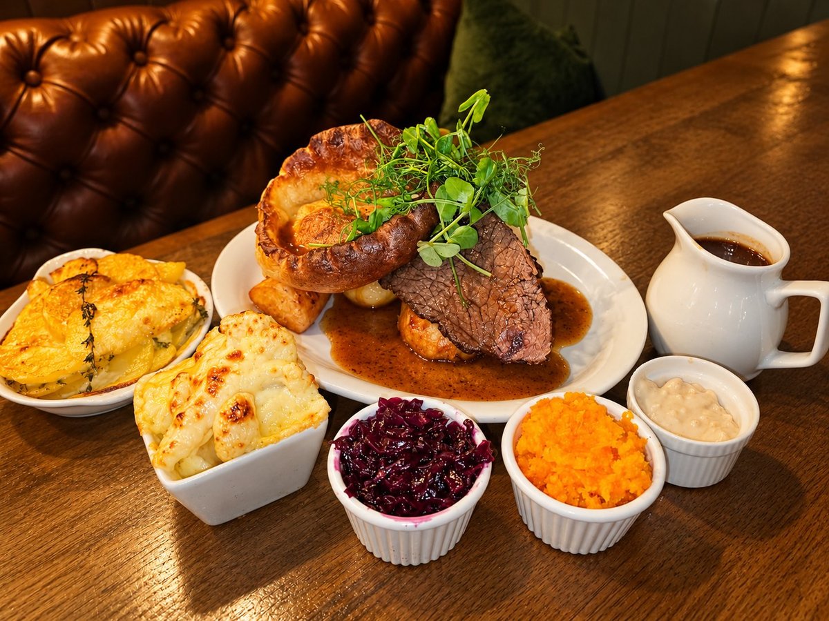 The Union Inn's Sunday roast — slow-cooked beef with Yorkshire pudding, roast potatoes, cauliflower cheese, glazed carrots, red cabbage and gravy